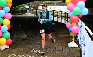 Photo of Rachel Piper at the end of the 2023 Country to Capital Ultra race