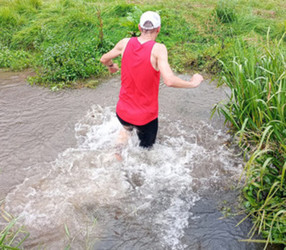 This photo shows Nick Macey crossing the river